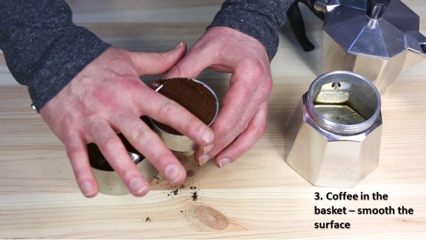 Brewing Guide Moka Pot - add coffee and smoothen surface Brewing Guide Moka Pot - add coffee and smoothen surface