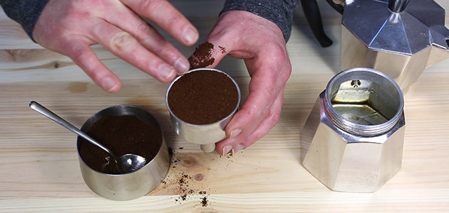 Brewing Guide Moka Pot - add coffee and smoothen surface